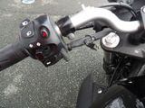 a close up view of a motorcycle ' s handlebars