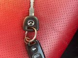 a car key sitting on the seat of a car