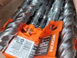 a box of drill bits and a pair of scissors in it