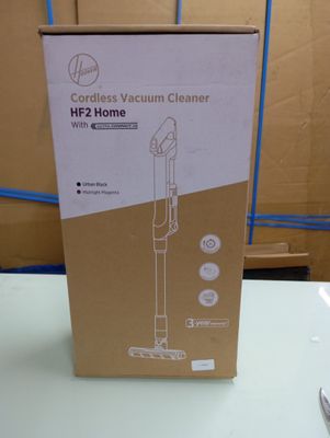 packaging for a cordless vacuum cleaner in a box on a table