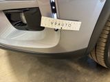 a sticker on the front bumper of a car