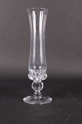 a glass vase that is sitting on a table