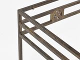 an image of a metal table with a metal frame on top of it