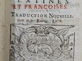 an open book with a drawing of a dragon on it