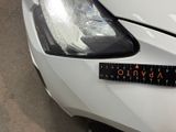 a sticker that says advino on the front of a car