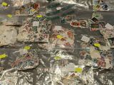 a lot of stamps and postcards on a table