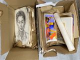 a cardboard box with a drawing of fridah and a roll of paper in it