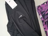 the nike leggings are next to a pair of leggings