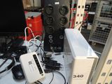many electronics that are on a table in a room