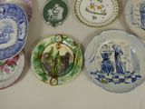 a lot of plates that are on the table