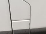 a close up of a door handle on a white van