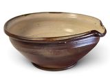 bowl with brown glaze and brown rim on white background