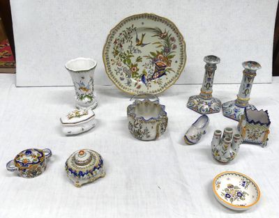 many different pieces of porcelain on the table