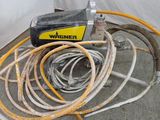 a picture of a bunch of hoses that are on the ground