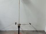 a metal pole with a hat on top of it