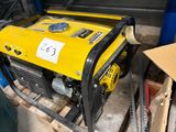 a yellow generator sitting on a pallet in a garage