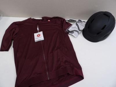 a hat and a shirt on a table next to a hat