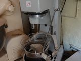an image of a kitchen with a mixer and other appliances