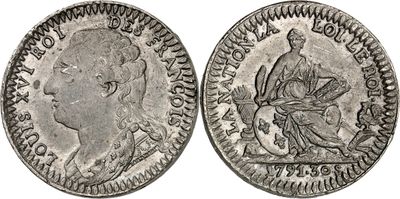 une pièce d'argent sur laquelle figurent les portraits d'un homme et d'une femme