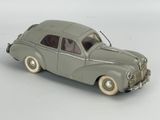 a toy car that is sitting on a white surface