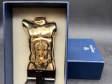an image of a gold statue of a man in a blue box