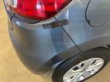 a close up of a car ' s rear end with a sticker on it