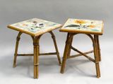 pair of bamboo stools with painted flowers and leaves on them