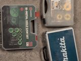 three tools that are sitting on the ground