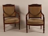 pair of antique chairs with upholstered upholstered back and arms