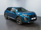 a blue suv parked in a room with a white wall