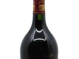 a bottle of wine that is sitting on a table