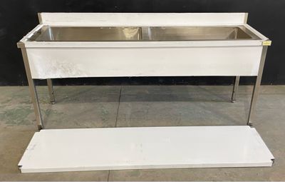an image of a stainless steel sink sitting on top of a counter