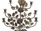 an image of a metal candelier with leaves on it