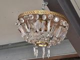 a chandelier hanging from the ceiling of a building