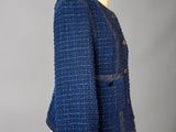 a blue tweed jacket on a mannequin mannequin mannequin mannequin mannequin mannequin mannequin mannequin manne