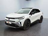 un SUV blanc garé dans une pièce au sol noir