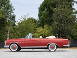 an image of a red convertible car parked in a parking lot