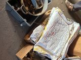 a box full of fish sitting on the floor next to a box of fish