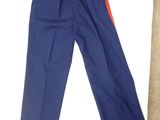 blue pants with a red stripe on the side of the pants
