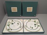 two plates that are sitting in a box on a table