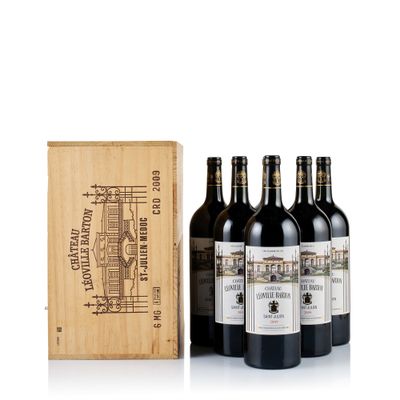 three bottles of wine in a wooden box with a wooden box