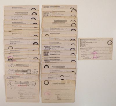a lot of old papers that are on the wall
