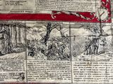 an image of a red and white cloth with a picture of a man on a horse