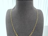 a gold chain necklace on a mannequin mannequin mannequin mannequin mannequin mannequin mannequin mannequin manne