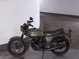 a motorcycle that is parked in a parking garage