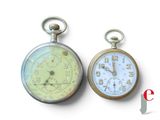 two clocks sitting side by side on a white surface