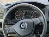 dashboard of a car with a steering wheel and dashboard gauges