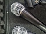 two microphones that are sitting in a case