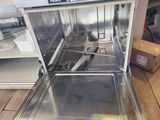 a dishwasher that is sitting in the middle of a kitchen