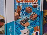 three games that are on the table in front of each other